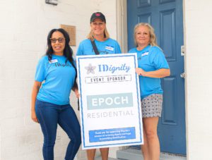 Epoch employees volunteering at IDignity.